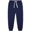 Novedad Otoño Pantalones Deportivos Jogger para Niños Estilo Europeo y Americano 2026 Color Sólido Versión Lisa para Niños Mayores Pantalones Largos de Felpa Pantalones Deportivos