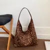 Bolso de lona de diseño nicho coreano transfronterizo 2026 nuevo estilo casual perezoso bolso de hombro bolsa tote de gran capacidad para ir al trabajo