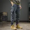 Nueva colección de otoño: Pantalones de trabajo americanos para hombre, de corte slim y elegantes, para uso en exteriores, con múltiples bolsillos y un diseño moderno de pierna cónica