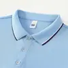 9912: Ropa de trabajo corporativa hecha a medida, incluyendo polos de manga larga con cuello de contraste, para fines de publicidad grupal; servicios de bordado proporcionados directamente por el fabricante
