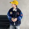 Roupa infantil para meninos outono jaqueta 2026 estilo Ano Novo crianças médias e grandes estilo primavera e outono menino bonito e estiloso uniforme de basebol de outono moderno