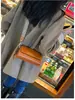 Bolso de mano estilo retro, bolsa para el teléfono del trabajo, bolso cruzado para mujer, nueva moda primavera/verano 2026, bolso pequeño único y elegante, versátil