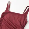 Artículo de AliExpress de venta caliente transfronterizo: Colección nueva primavera 2026, elegante y moderno vestido sin mangas de color liso con estampado de espina de pez y abertura