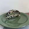 Pinza para el pelo con clip trasero de media luna negra, estilo coreano, logo dorado, estampado de leopardo, mango hueco de acetato grande, clip de tiburón