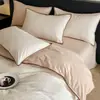 Juego de ropa de cama de cuatro piezas de jacquard de algodón puro con borde de concha de lujo, juego de ropa de cama para el hogar de tres piezas con sábana bajera de color liso para cama matrimonial