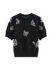 Top de punto negro ligero de manga corta con diseño de mariposa de pedrería Hot-Fix Moda Verano 2026 Camiseta adelgazante