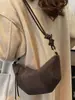 Bolso pequeño retro Shuai Mi para mujer, nuevo bolso de moda tipo 'dumpling' otoño 2026, bolso de hombro texturizado, bolso cruzado para el día a día