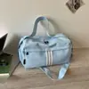 2026 Nueva Bolsa de Viaje Rayada de Gran Capacidad Moderna Genial de Moda Bolsa de Gimnasio Deportiva Versátil Bolsa de Equipaje para Viajes Diarios Versátil