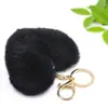 Venta caliente llavero de felpa de amor llavero de bola de pelo de corazón de melocotón colgante accesorios para equipaje de dama coche al por mayor