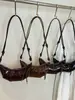 Bolso de nicho transfronterizo para mujer 2026, bolso versátil de hombro y cruzado, bolso de cuerno moderno y súper popular, bolso nuevo y moderno ligero