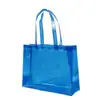 Bolsa de mano transparente para ropa al por mayor bolsa de PVC de alta gama bolsa de plástico portátil logo personalizado para llevar en la mano bolsa de regalo de mano