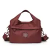 Bolsa Transversal Multifuncional para Mulheres Nylon Impermeável Versátil Bolsa de Ombro 2026 Nova Pano Oxford Multicamada de Mão Pequena Quadrada