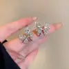 Pendientes de Aro Plateados con Diamantes Completos 2025 Nuevo Estilo Caliente Lujo Accesible Pendientes de Gama Alta Únicos Elegantes Versátiles