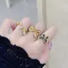 Anillo Nuevo de Esmalte Vintage con Lazo de Cinta para Mujer Versátil Nicho Alto Gama Anillo para Dedo Índice de Mariposa