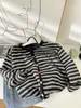 Suéter Rayado Americano Retro Multibotones para Mujer Otoño 2025 Nuevo Estilo Perezoso Cardigan de Punto Engrosado 6205