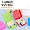 Pastillero cruzado de 4 compartimentos de plástico pequeño Pastillero cuadrado portátil Pastillero portátil pastillero al por mayor Regalos de Taobao