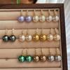 Pendientes Simples de Perla Shijia Diamante de Alto Carbono Pendientes de Diseño Nicho de Lujo Ligero Blanco Frío Imitación Blanco Australiano Verde Pavo Real de Tahití