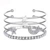 Conjunto de 4 pulseras creativas de aleación con diamantes de imitación y apertura de luna y estrella de cinco puntas para mujer.