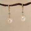 Nuevos y elegantes pendientes de estilo coreano con hebilla de perla de sirena, de alta calidad, con diseño de nicho, sencillos y ligeros, de lujo, a la moda.