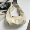 Bolso cruzado de otoño 2026 con remaches para la axila para mujer, bolso de hombro versátil con textura vintage, bolso de mano