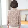 Camiseta de punto de poliéster de manga larga para mujeres de mediana edad, estilo nuevo, adecuada para madres de 50 años, corte holgado, con cuello camisero y diseñada como capa base