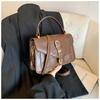 Bolsa de design de nicho feminina 2024 outono nova moda simples ombro transversal casual viajante portátil pequena bolsa quadrada