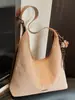 Bolsa Tote Grande de Couro Estilo Coreano Retrô para Mulheres Inverno 2025 Bolsa de Mão Simples para Trabalho e Deslocamento Bolsa de Ombro