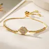 Pulseira Aogu Transfronteiriça Elegante de Luxo Leve Cobre Banhado a Ouro Real Zircônia Flor, Joia de Alto Padrão com Design Único