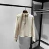 Top atlético de manga larga para mujer con media cremallera y cuello medio abierto, disponible en varios colores para el uso diario y los desplazamientos.. 13463
