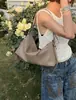 Bolsa de Hombro Única de Diseño de Nicho Nuevo Verano 2026 Bolso Cruzado de Cuero Genuino Bolso Cruzado Versátil para Viajes Diarios Bolso Casual de Axila
