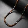Collar de estilo bohemio transfronterizo europeo y americano con cuentas de turquesa y madera intercaladas, una cadena para la clavícula de nicho y sofisticada para hombres, al por mayor