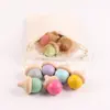 Suministro directo de fábrica artesanías de madera juguetes para pintar bolsas para niños materiales didácticos educativos de arte color madera de loto tuercas