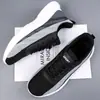 Zapatos de Otoño Transpirables y Cómodos de Tejido Fly-Knit Zapatillas de Correr con Cordones Zapatos Casuales de Malla Zapatos Deportivos Fabricantes Venta al por Mayor Zapatos para Hombre de Talla Grande