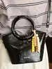 Bolso Cubo de Moda Casual Simple de Nicho Tendencia Primavera 2026 Nuevo Bolso de Hombro Cruzado para Mujer