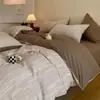 2026 Novo Modelo Fio 100% Algodão Tingido em Fio Jacquard Texturizado Malha Waffle 100% Algodão Luxo Leve Estilo Simples Conjunto de Quatro Peças