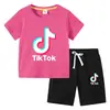 Camiseta infantil 2022 TikTok verano nueva ropa infantil de comercio exterior coreana pantalones cortos de manga corta para niños traje de dos piezas