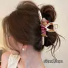 Atacado de acessórios de cabelo Dongdaemun Coreia: Grampos de cabelo da nuca da moda para mulheres, presilhas tubarão de alta qualidade e requintadas