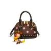 Yue Zi 2026 Outono Inicial Nova Versátil Temperamento Moda Chique Simples Portátil Bolsa Concha Bolsa Transversal Casual de Bolinhas