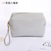 Nova bolsa de maquiagem em couro PU com padrão cruzado, bolsa de higiene pessoal à prova d'água, nécessaire multifuncional portátil para armazenamento de skincare
