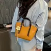 Bolso Pequeño Elegante de Gama Alta para Mujer 2026 Nueva Moda Bolso Cruzado Versátil Bolso de Mano Exquisito Bolso Cubo Bolso Tote Pequeño