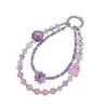 Nuevo colgante de teléfono de doble cadena con un toque de alta gama, cuentas luminosas de flor de cerezo, correa de muñeca para teléfono, charm para bolso, pequeño regalo para mujeres