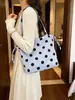 Bolsa casual transfronteiriça de grande capacidade com bolinhas para mulheres, nova bolsa de ombro versátil de verão 2026, bolsa tote estilo floresta para o dia a dia