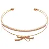 Brazalete abierto de doble capa con lazo de circón, temperamento exquisito francés, brazalete Joker, joyería de lujo ligero de alta gama, venta al por mayor