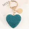 Nuevo Estilo Llavero de Aleación con Forma de Corazón Creativo Colgante para Bolso Estuche de Auriculares Incrustado con Diamantes Accesorios de Etiqueta de Metal