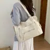 Bolsa de mano retro americana transfronteriza para motocicleta para mujer, primavera 2026, gran capacidad, bolso casual de hombro y axila a la moda, moderno