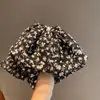 Clip para coleta alta con lazo floral dulce japonés de Corea del Sur, pinza para el pelo de disco de perla de alta gama, moderno y exquisito para mujer
