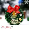 Feliz Navidad mini corona de Adviento de cinco puntas con cascabeles, lazo y anillo de vid escena en miniatura