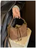 Bolsa de Mão Retrô de Nicho Feminina 2026 Nova Outono Camurça Toque de Luxo Bolsa de Ombro Único Transversal Bolsa Bolinho