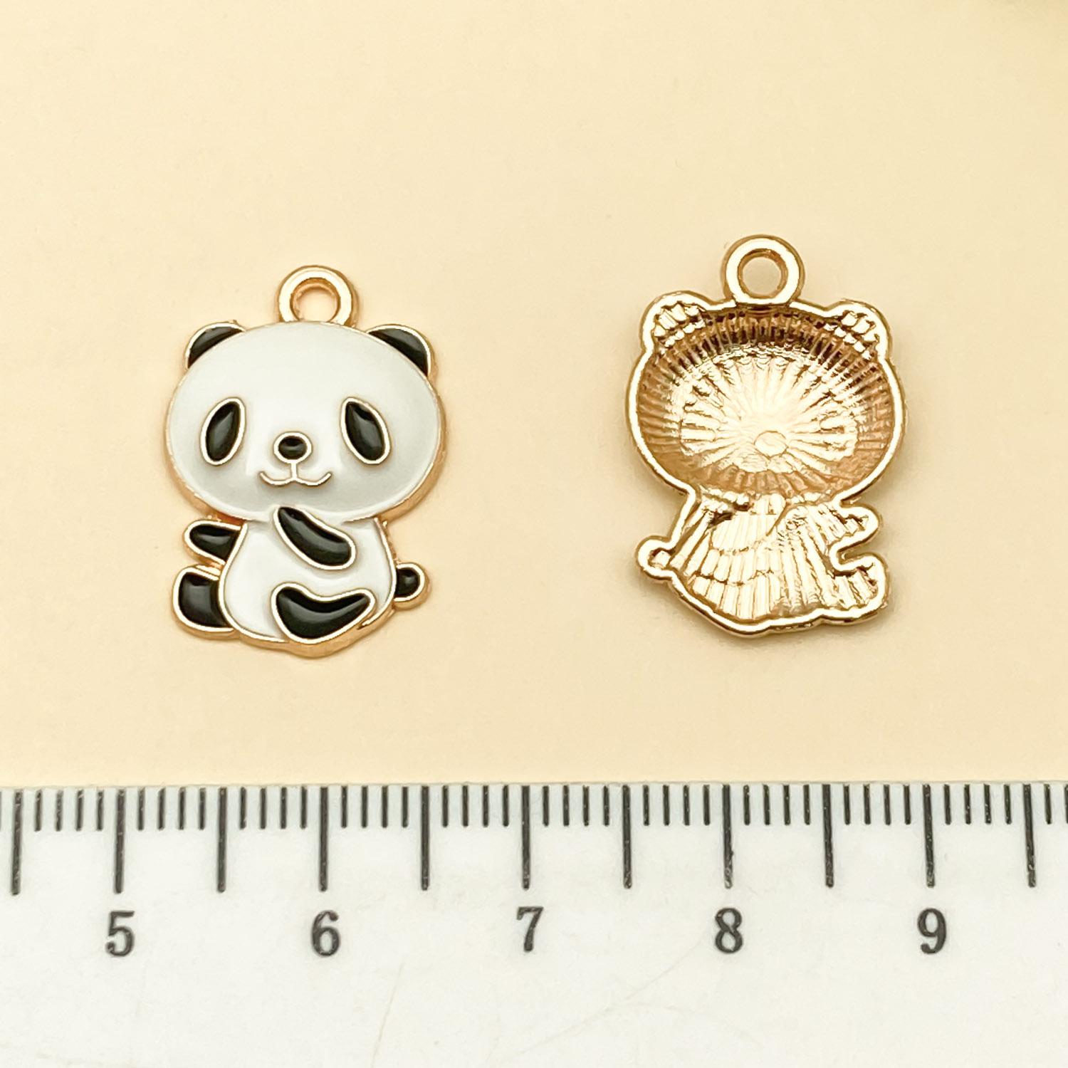 21688-DL-白色滴油kc锌合金红苹果熊猫25x20mm