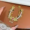 Pulseira Europeia e Americana de Luxo Leve com Coração, Laço e Franja, Fashion e Versátil, Design de Nicho com Toque de Alto Padrão, Pulseira de Laço